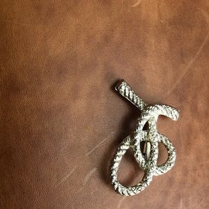 Silver love knot brooch